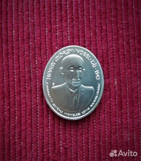 Монеты овальные