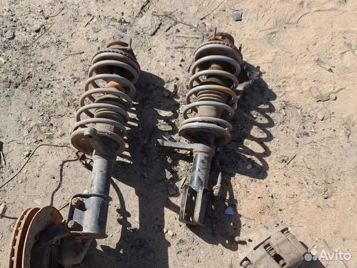 Передние стойки ваз 2110