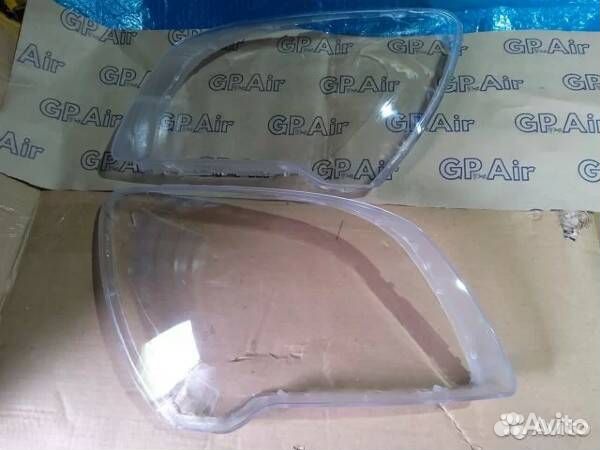 Стекло фары Kia Sportage II Рестайлинг