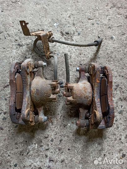 Суппорт передний Mitsubishi Lancer X 1.8 МКПП