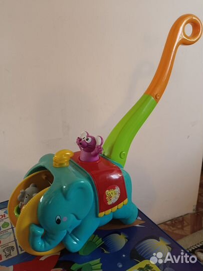 Игрушка каталка с ручкой