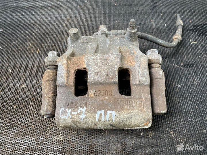 Передний Суппорт Mazda CX7