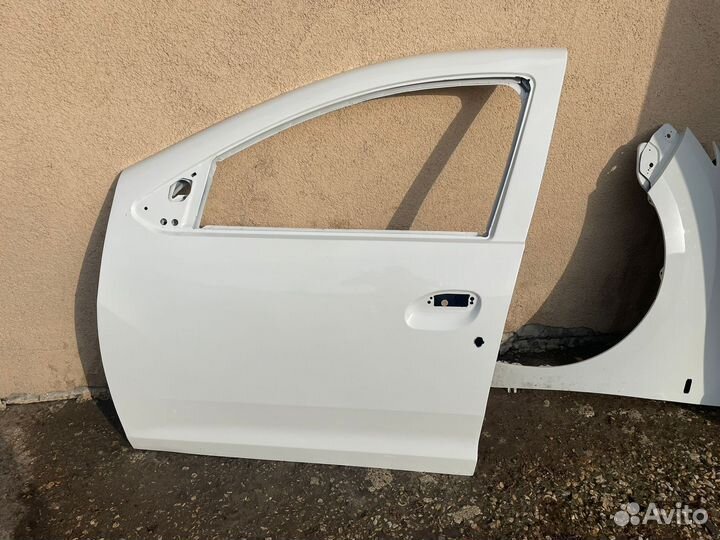 Дверь передняя левая Логан 801012479R