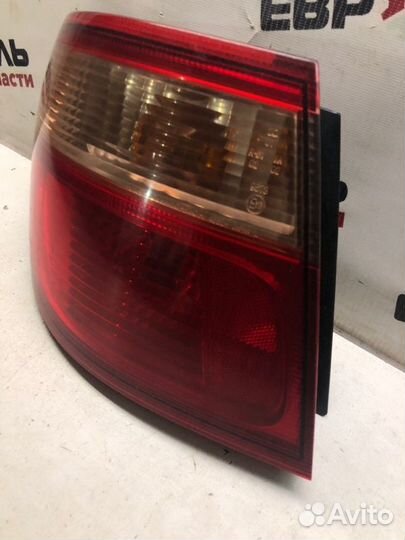 Фонарь левый Nissan Almera N16 седан 1.8 QG18 2001