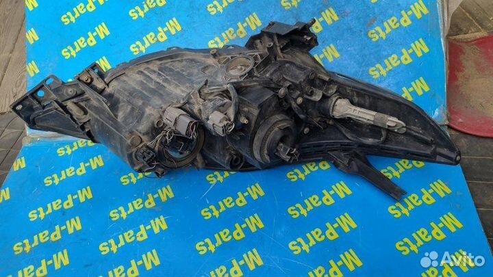 Фара левая Mazda Premacy crew 2009