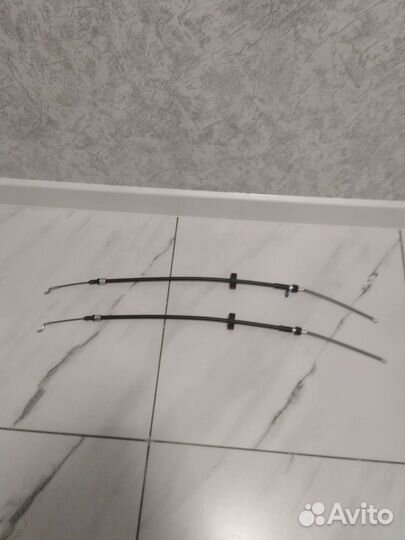 Трос стояночного тормоза