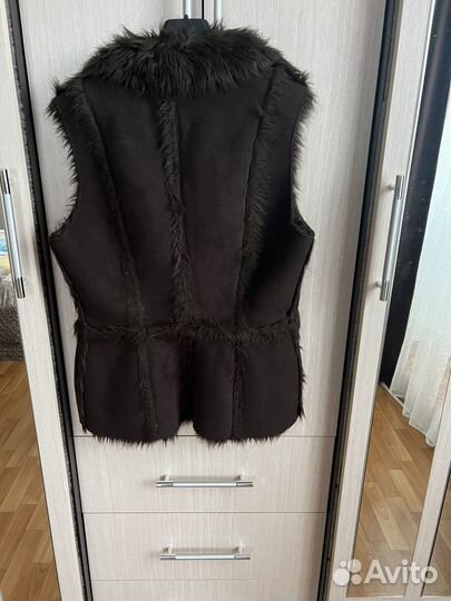 Меховая жилетка