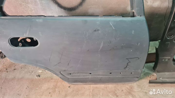 Задняя правая дверь Nissan Almera classic N16