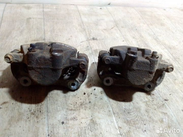 Суппорт тормозной передний Opel Insignia A16XER