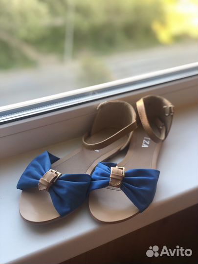 Сандалии новые