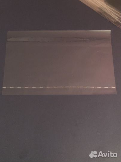 Целлофановая упаковка от диска PlayStation