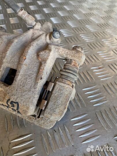 Суппорт тормозной задний правый Hyundai Elantra HD