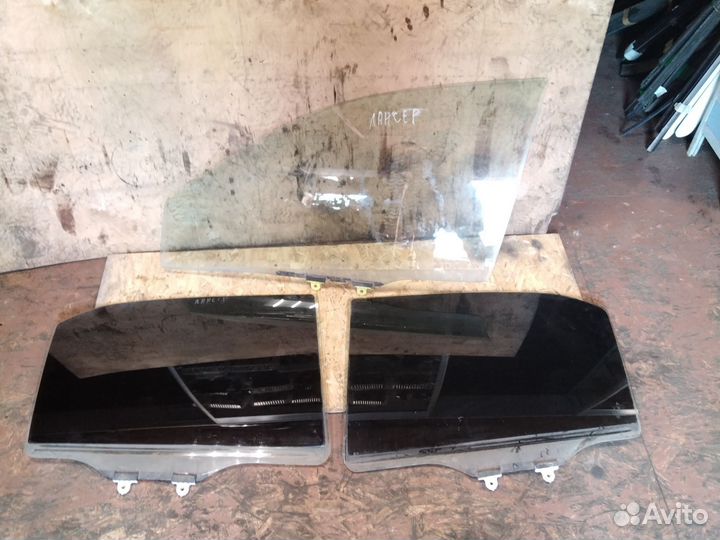 Стекло дверное Mitsubishi Lancer 9