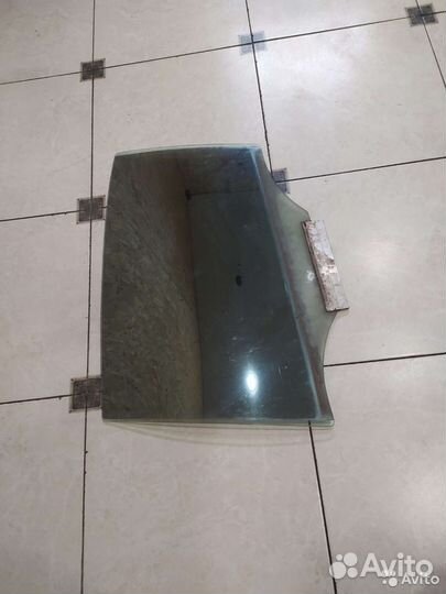 Стекло двери заднее левое Opel Astra G