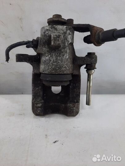 Суппорт тормозной задний правый Peugeot 308