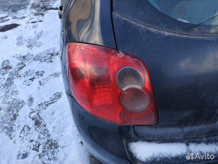 Фонарь задний левый Toyota Auris E150 дорестайлинг