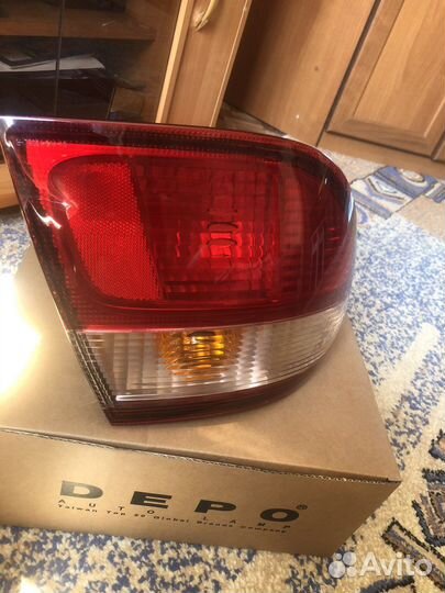 Фонарь задний nissan almera n16