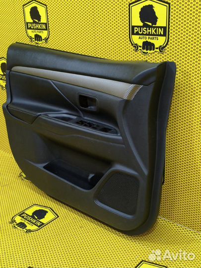 Обшивка двери карта передняя левая Mitsubishi