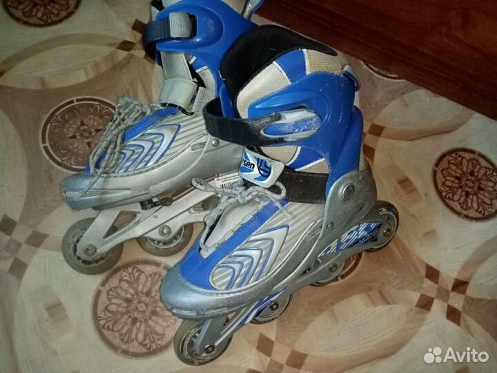 Роликовые коньки