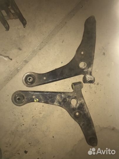 Рычаг нижний передний Лансер 9