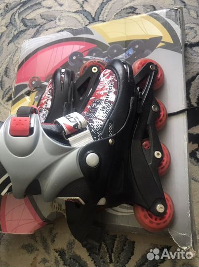 Коньки роликовые