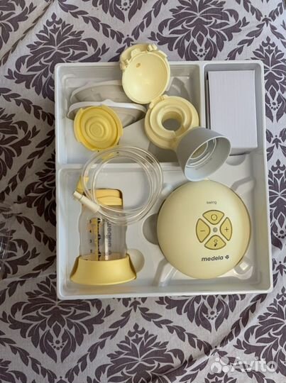 Молокоотсос электрический medela swing flex