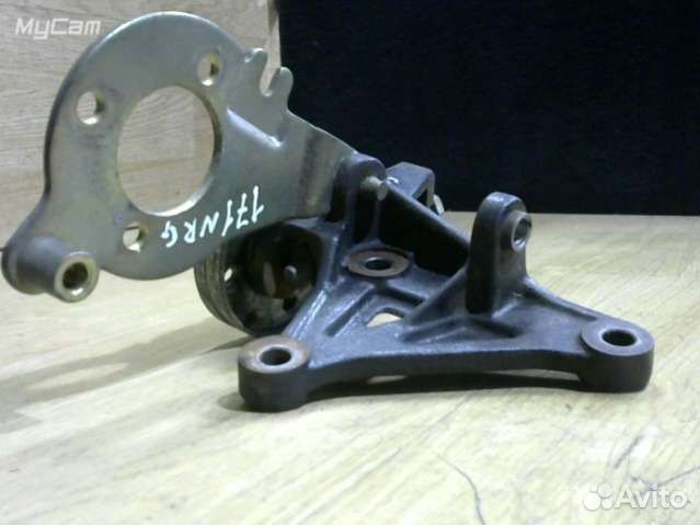 Натяжитель ремня генератора Nissan Primera 11