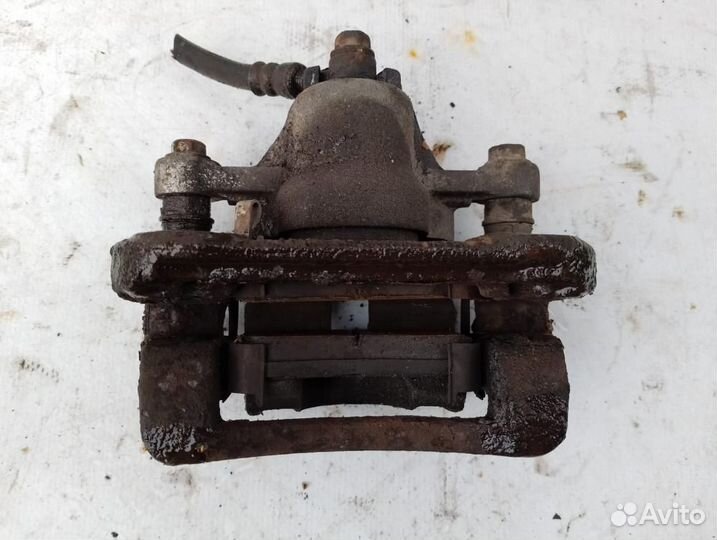 Суппорт тормозной задний левый 2007-2012 Kia Ceed