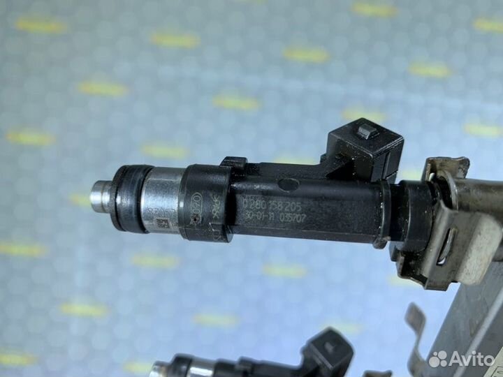 Форсунки с рампой Opel Astra J A14NET 2013