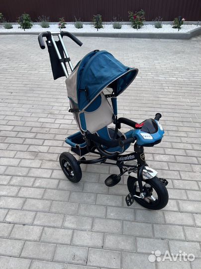 Детский трехколесный велосипед с ручкой