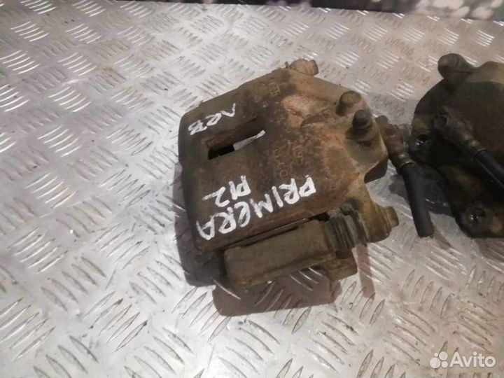 Тормозные суппорта переднее Nissan Primera P12 1.6