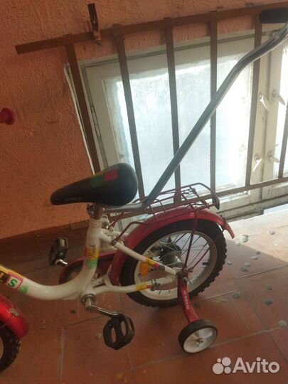 Детский велосипед с родительской ручкой