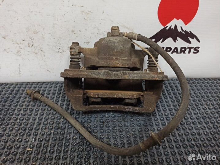 Суппорт тормозной передний левый Honda Stream RN1