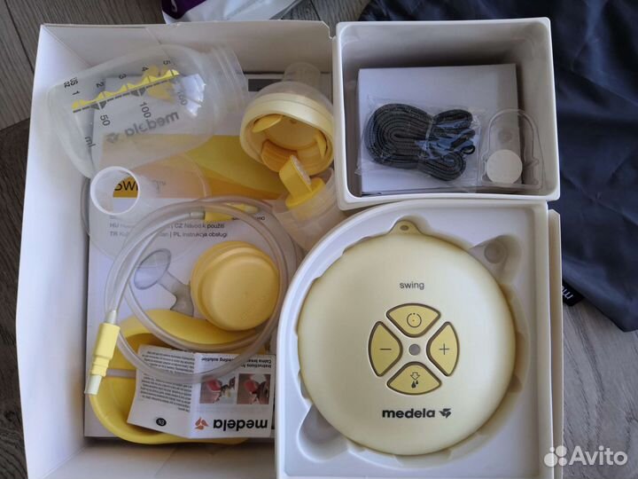 Молокоотсос Medela Swing электрический