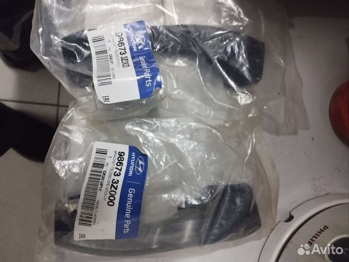 Скоба крепления омывателя фары 986733Z000 i40