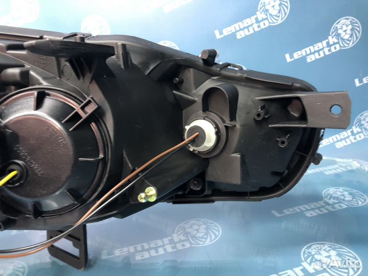 Фара левая на Mitsubishi Lancer 10