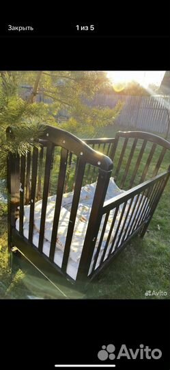 Кроватка детская с маятником