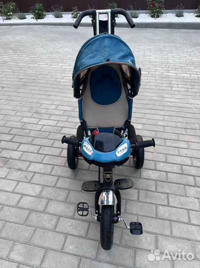 Детский трехколесный велосипед с ручкой