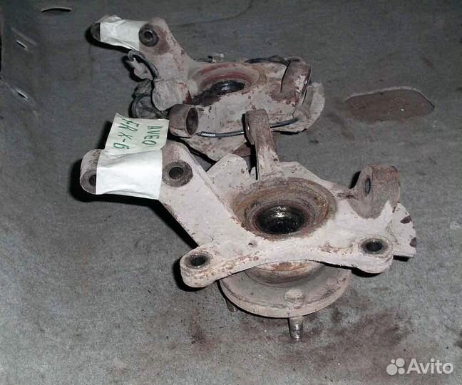 Кулак поворотный левый Chevrolet Aveo T200 Хэтчбек