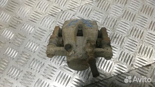 Суппорт тормозной задний левый toyota avensis T25