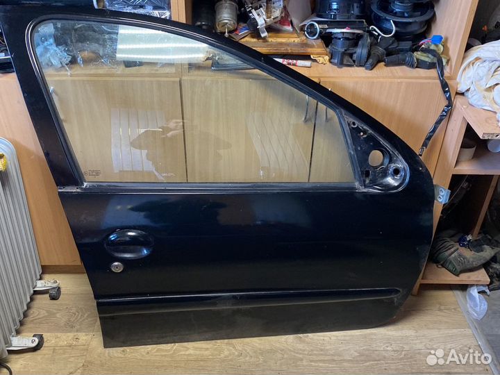 Peugeot 206 рестайлинг передняя правая дверь