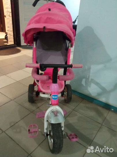 Трехколесный велосипед с ручкой