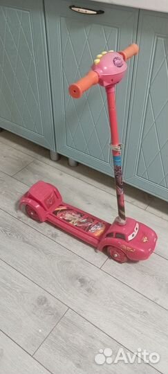 Детский самокат четырех колесный