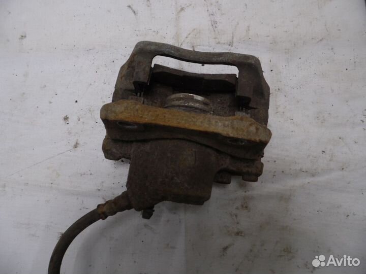 Суппорт тормозной передний правый Renault Logan 1