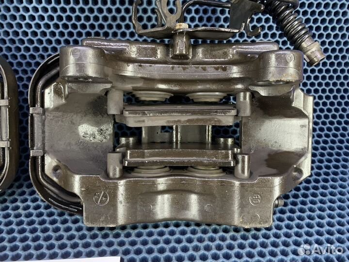 Суппорт задний 4 поршневой Touareg Audi Q7 Cayenne