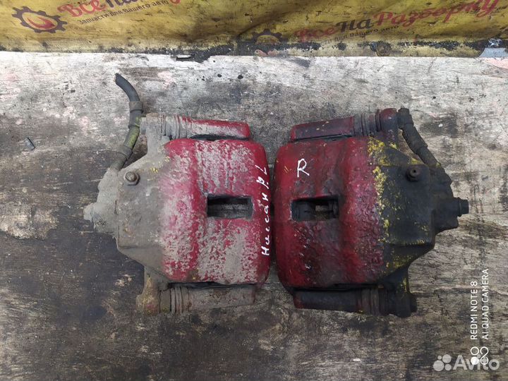 Суппорт передний Nissan Primera P11