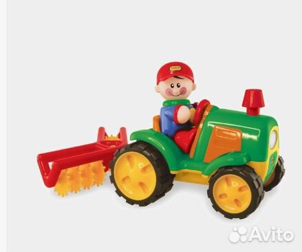 Трактор с бороной tolo