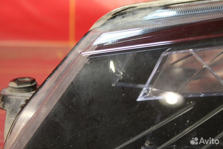 Фара левая Skoda Superb