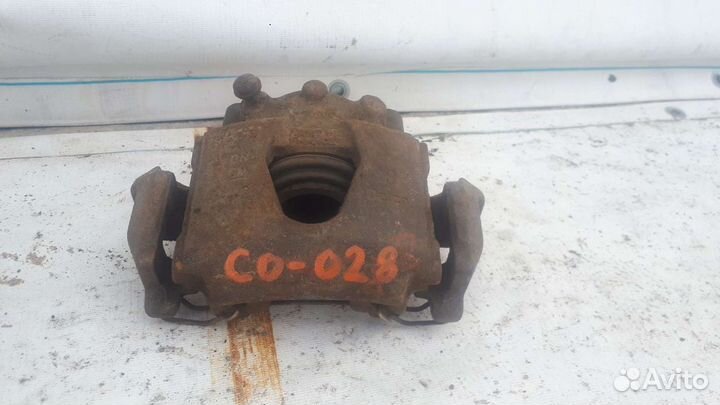 Суппорт передний Opel Corsa Опель Корса