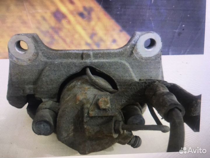 Суппорт тормозной передний левый Audi A6. C5